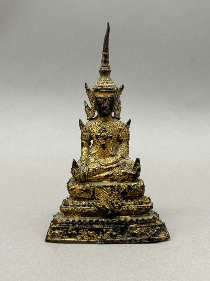 Lot including: 
- Adorned Buddha, gilded...
