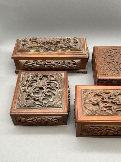 Reunion of four carved and openwork wooden...