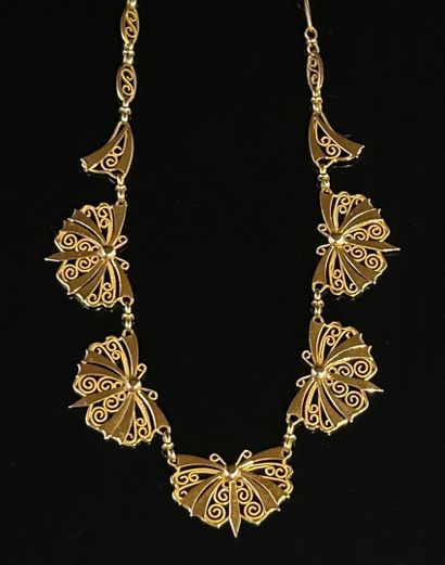 Collier en or jaune 18 K (750°/°°), à mailles...