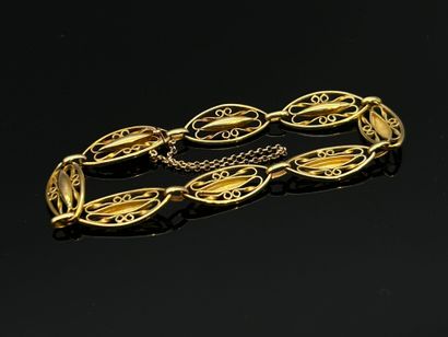 Bracelet en or jaune 18K (750°/°°), à mailles...