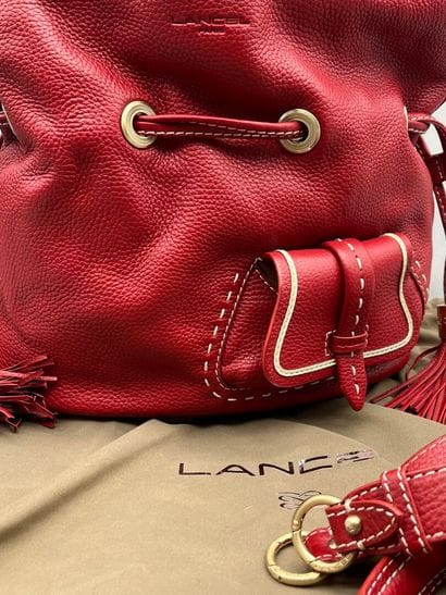 LANCEL PARIS. Sac avec bandoulière en cuir...