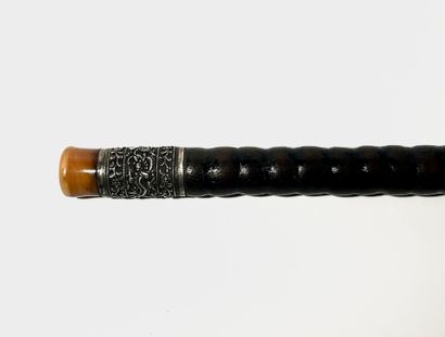 *Opium pipe in ringed exotic wood with patina....