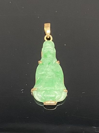 Deux pendentifs comprenant:
- Un anneau fin...