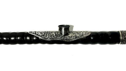*Opium pipe in ringed exotic wood with patina....