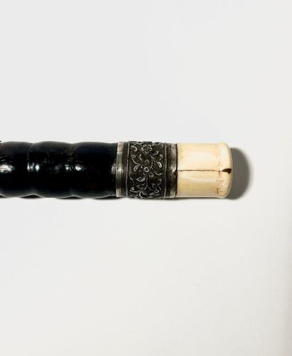*Opium pipe in ringed exotic wood with patina....