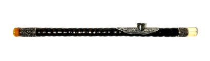 *Opium pipe in ringed exotic wood with patina....