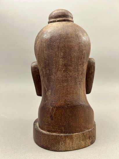 Carved wooden head of Jayavarman. The head...