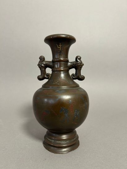 Small baluster-shaped vase in bronze with...