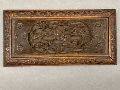 Rectangular wooden box carved on all sides...