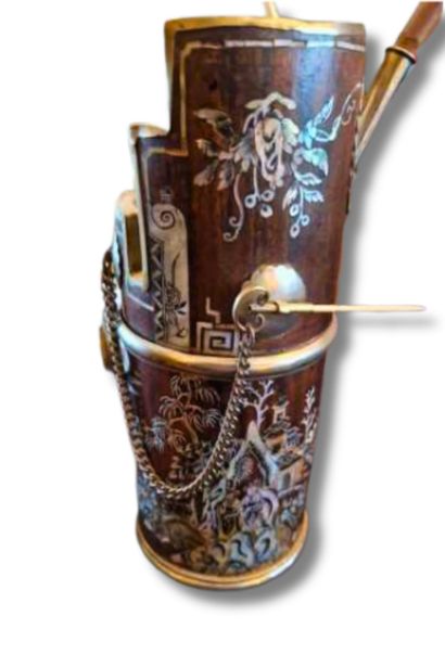 Reunion of two wooden water pipes decorated...