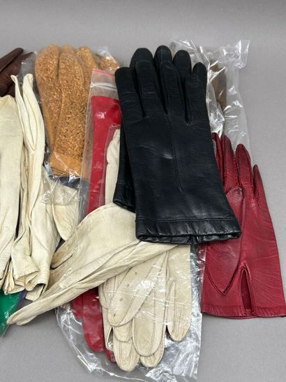 Lot including: 
- Christian DIOR. 
Pair of...