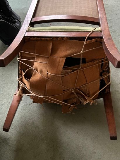 *Pair of armchairs in molded and carved mahogany...