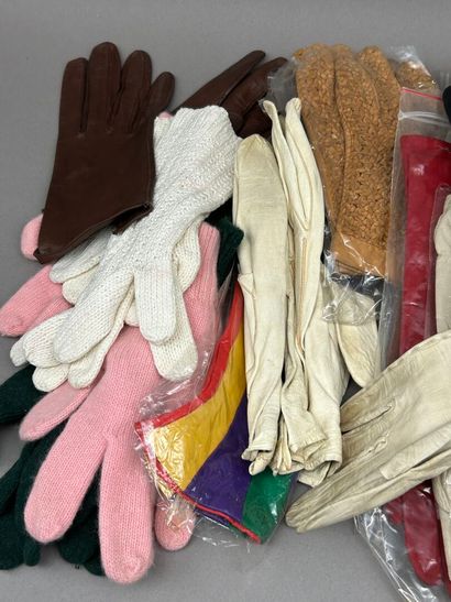 Lot including: 
- Christian DIOR. 
Pair of...