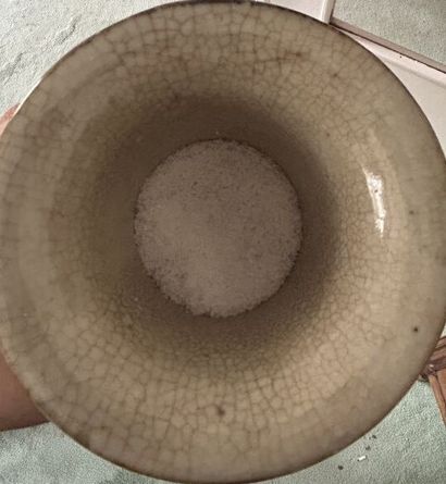 *Cracked stoneware diabolo vase with central...