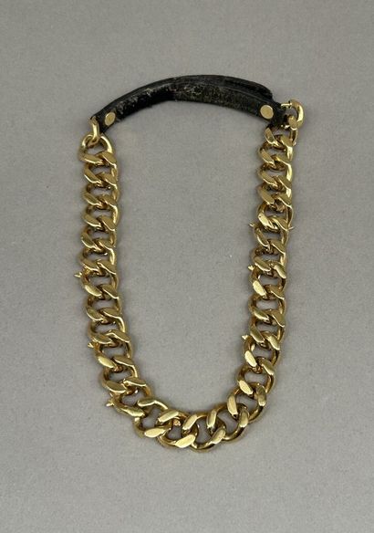 Louis VUITTON.
Gold-plated gourmette chain...