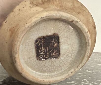 *Cracked stoneware diabolo vase with central...