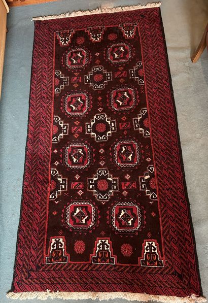 *Lot of 2 rugs, including: 
- a rectangular...