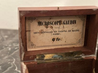 *A collection of brass scientific instruments,...
