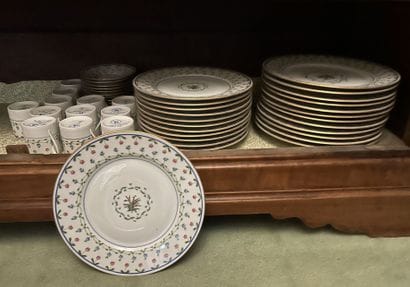*LIMOGES. 
Polychrome porcelain service with...