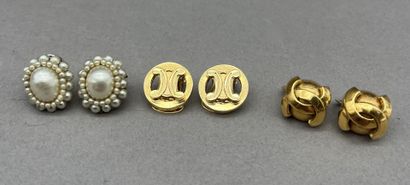 Lot including: 
- CHANEL.
Pair of ear clips...