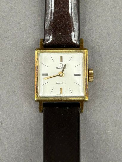Lot including: 
- OMEGA. 
Ladies' wristwatch...