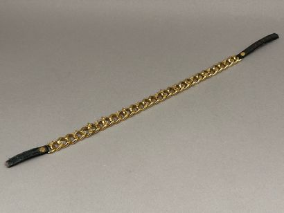 Louis VUITTON.
Gold-plated gourmette chain...