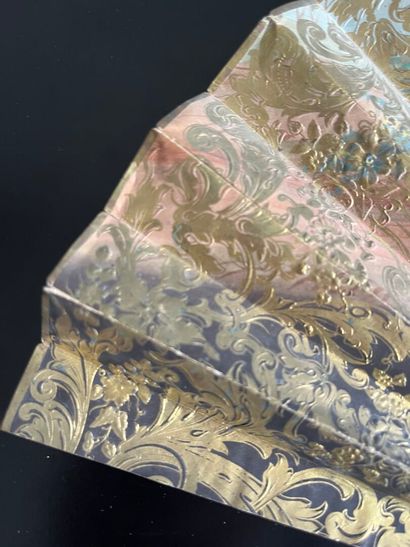 Wallpaper fan with a gallant scene on one...