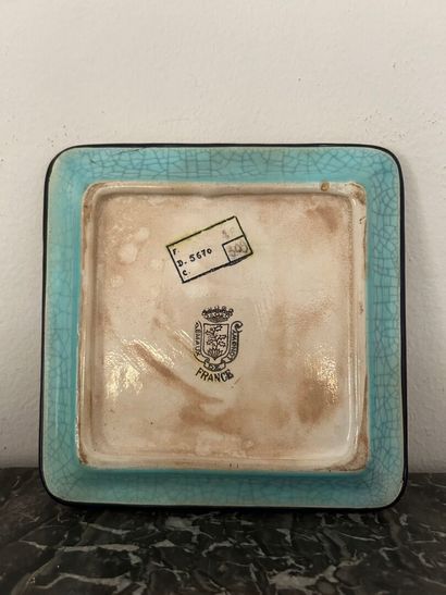 *LONGWY. 
Small glazed earthenware square...