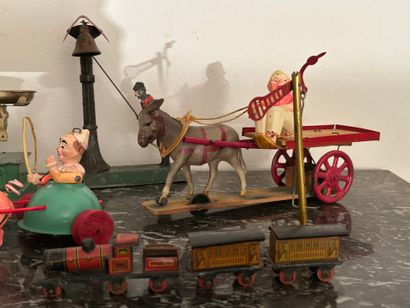 *Lot of pull toys or mechanical automatons...