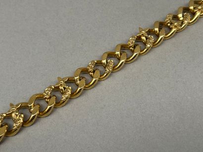 Louis VUITTON.
Gold-plated gourmette chain...
