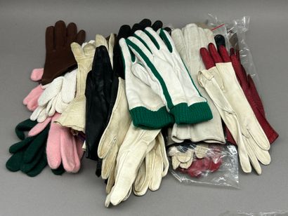 Lot including: 
- Christian DIOR. 
Pair of...