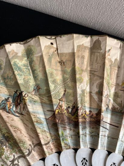 Wallpaper fan with a gallant scene on one...