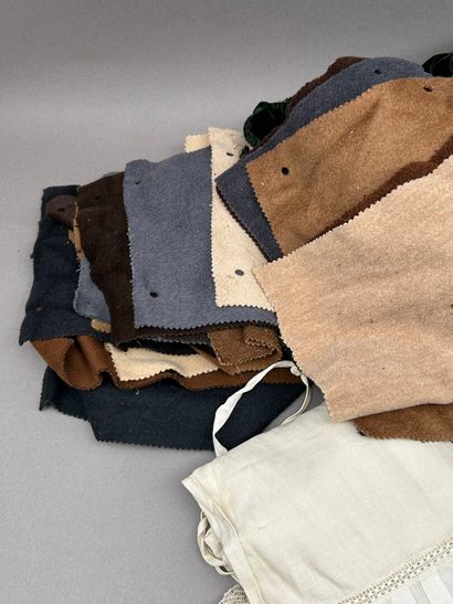 Fashion lot including: 
- A cream-colored...