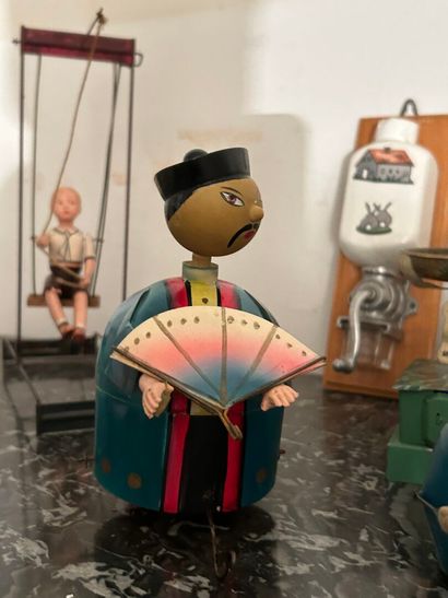 *Lot of pull toys or mechanical automatons...
