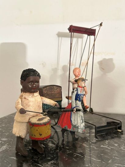 *Lot of pull toys or mechanical automatons...