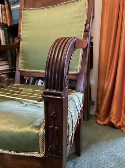*Pair of armchairs in molded and carved mahogany...