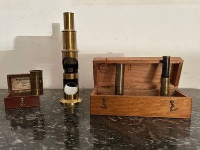 *A collection of brass scientific instruments,...
