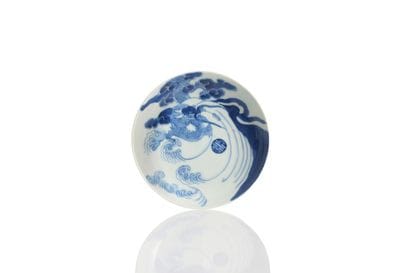 A rare blue-and-white porcelain cup, known...
