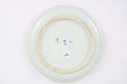 A blue-and-white porcelain dish known as...
