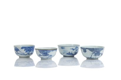 Set of four large blue-and-white porcelain...