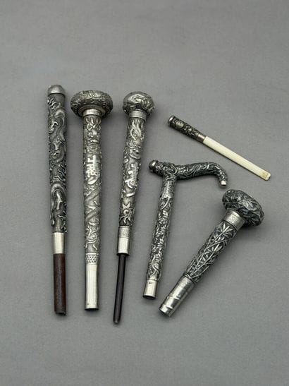 Five 800° silver cane and parasol knobs°°...