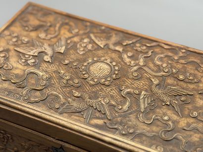 Rectangular wooden box with carved decorations...