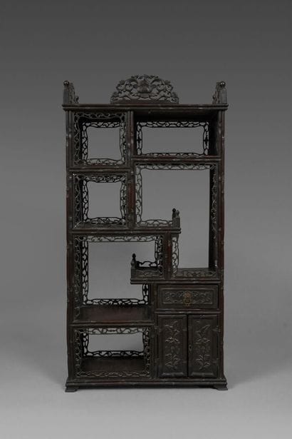 Small wall shelf made of molded and carved...
