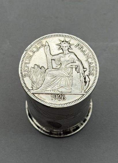 A cylindrical opium box made of silver-plated...