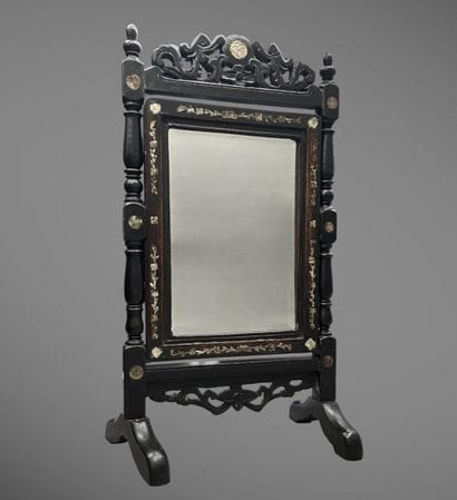 A tilting tabletop mirror made of exotic...
