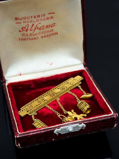 A 750°/°° (18K) gold brooch-barrette featuring...