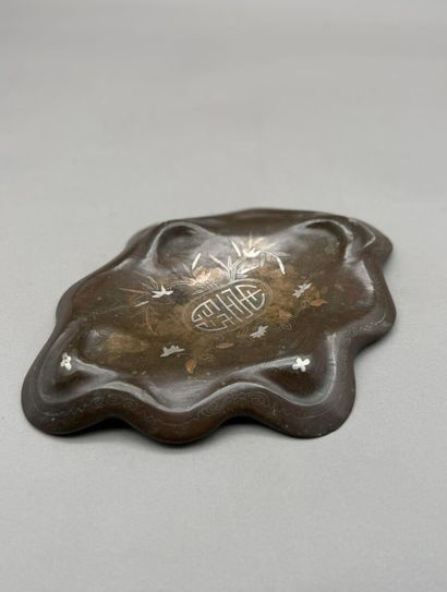 Bronze lotus-leaf-shaped incense burner base...