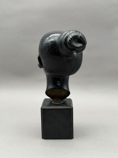 BIEN HOA. 
Bronze head of a Laotian woman...