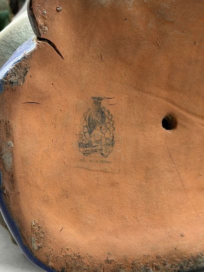MAY CAI. 
A partially polychrome-glazed stoneware...