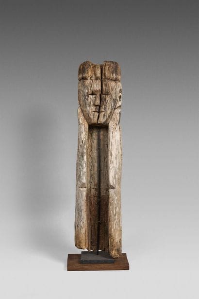 Jaraï mourner carved from a single piece...